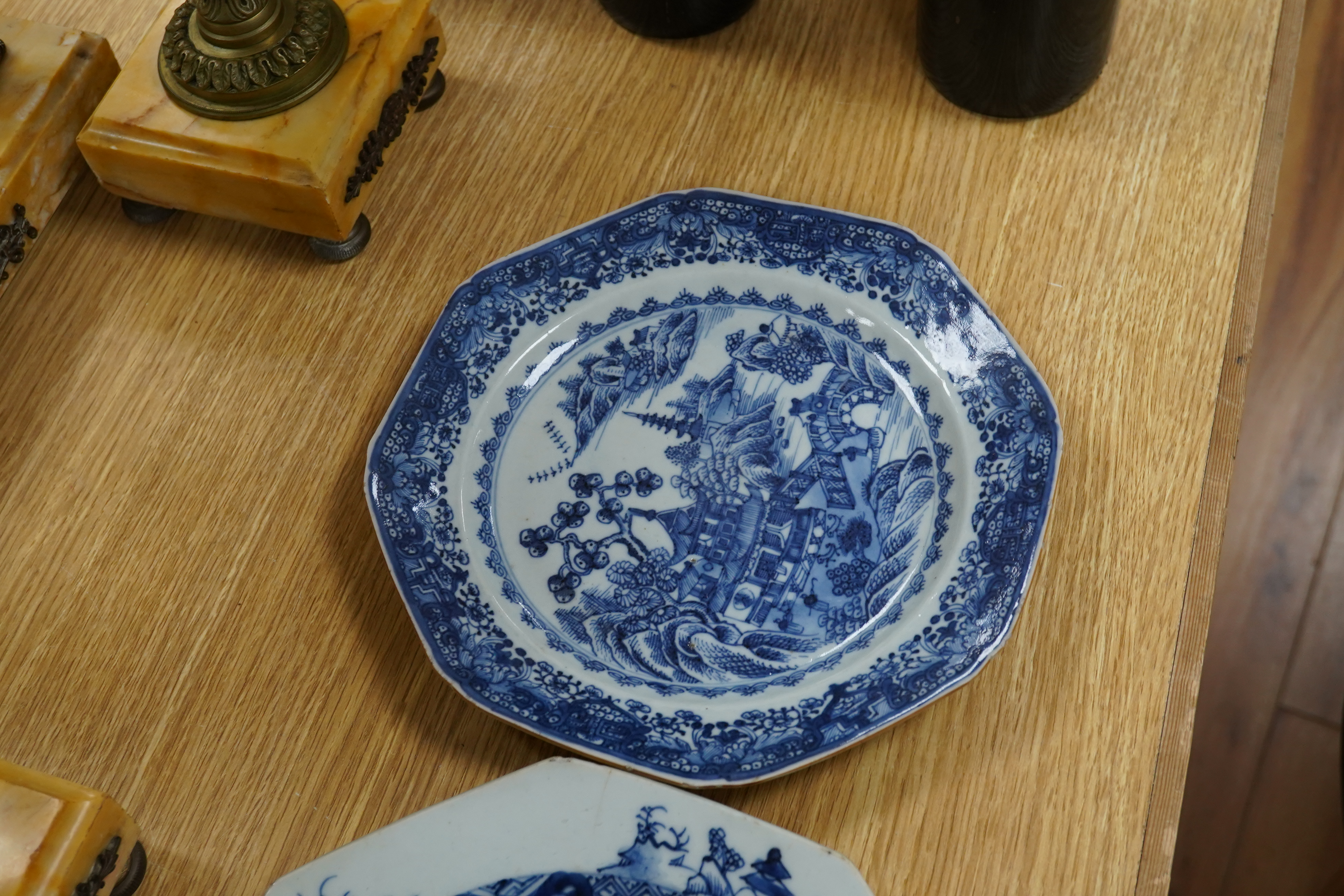 Five 18th century Chinese Export blue and white plates, largest 24cm diameter. Condition - all have varying amounts of damage